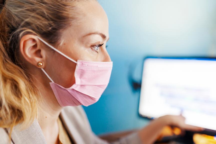 Healthcare worker at computer