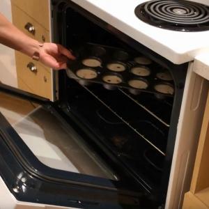 Image of cookies going into oven 