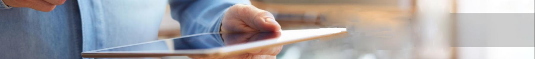 News Person reading news on tablet