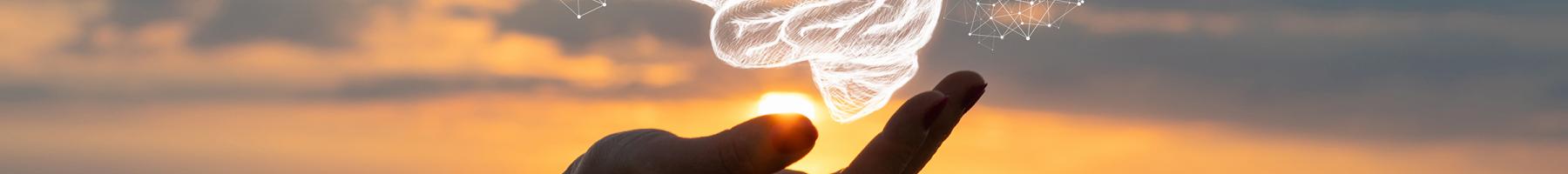 Table ronde sur la recherche axée sur les clients Une main qui tient une image électronique d'un cerveau