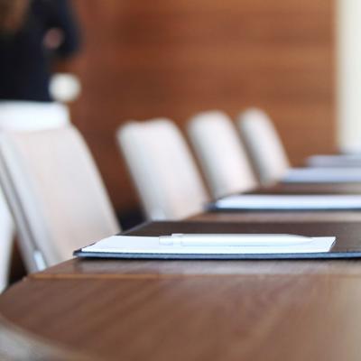 Image of empty boardroom chairs