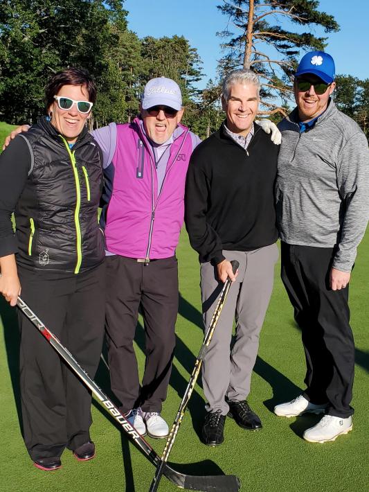 Photo of a golf foursome