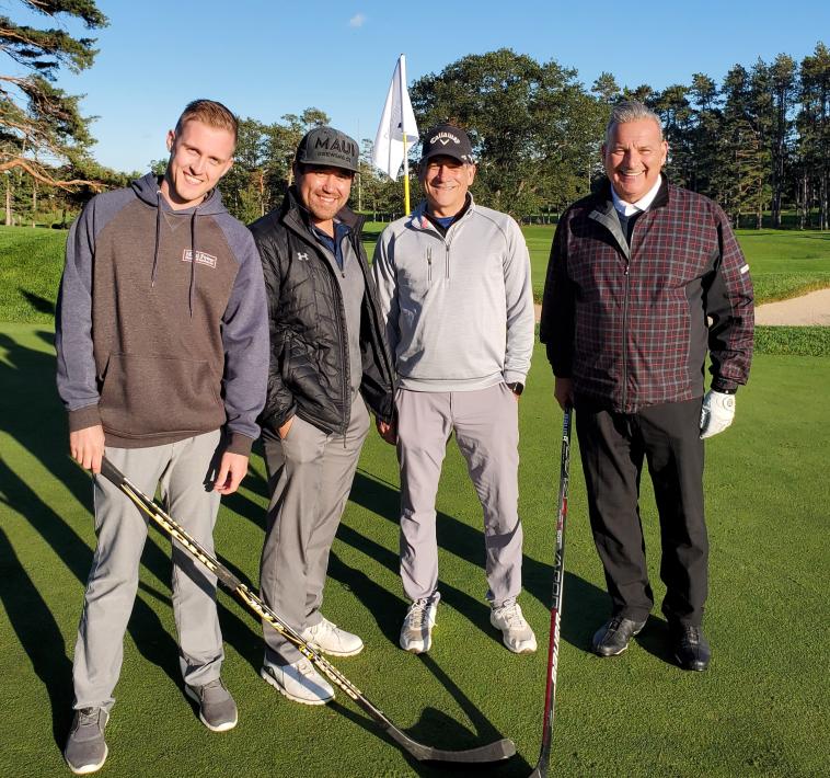 Photo of a golf foursome