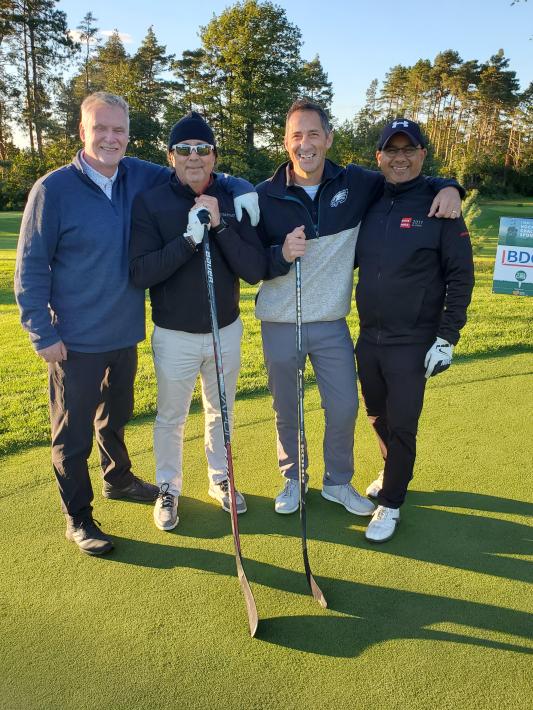 Photo of a golf foursome