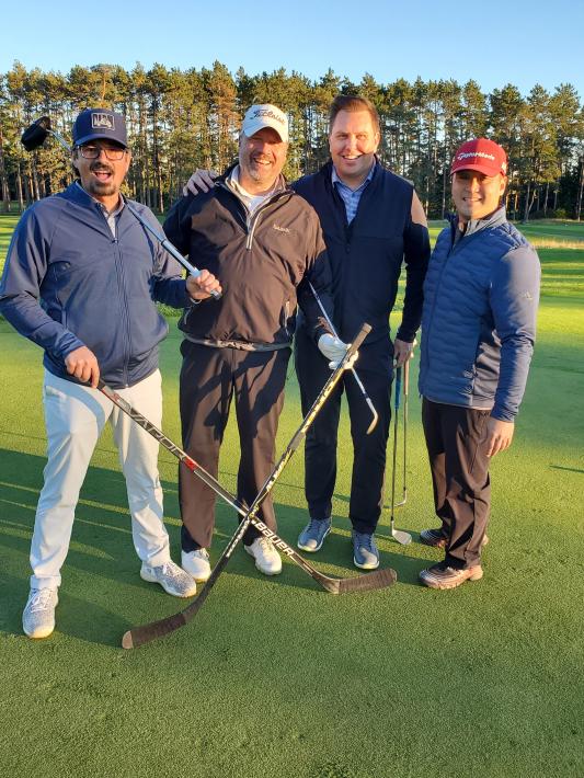 Photo of a golf foursome