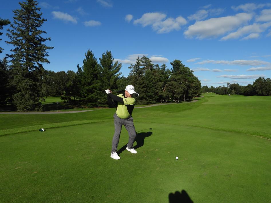Photo of person playing golf