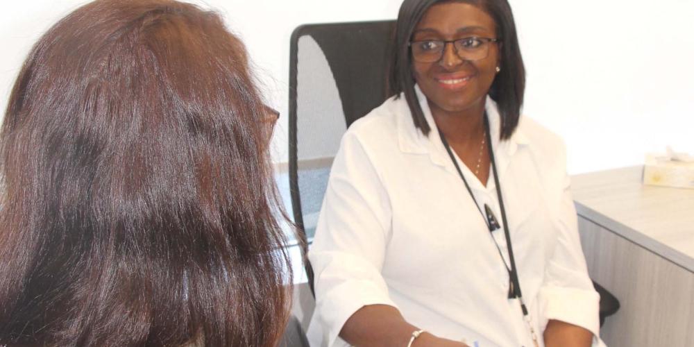 Physician speaking with a person