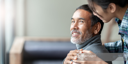 Man with caring hand on shoulder